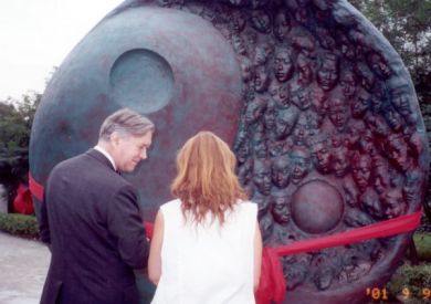 French Ambassador and Laury in front of East Meets West - still in coloured plaster