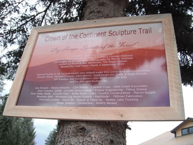 The plaque acknowleging contributors for this Crown of the Continent Sculpture Trail detailing Log Henge - Spirits of the Forest sculpture
