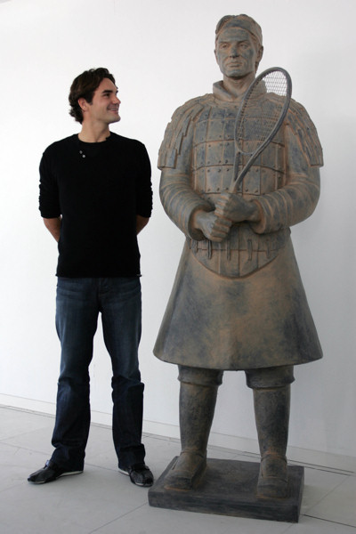 Tennis Master Cup Shanghai qualifier - Number 1 ranking tennis player Roger Federer with his Tennis Terracotta Warrior sculpture in Madrid, October 2007